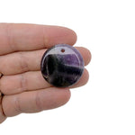 Round gemstone pendant featuring a drilled natural crystal disc charm from GemstoneGO, showcasing vibrant crystal colors and polished surface.