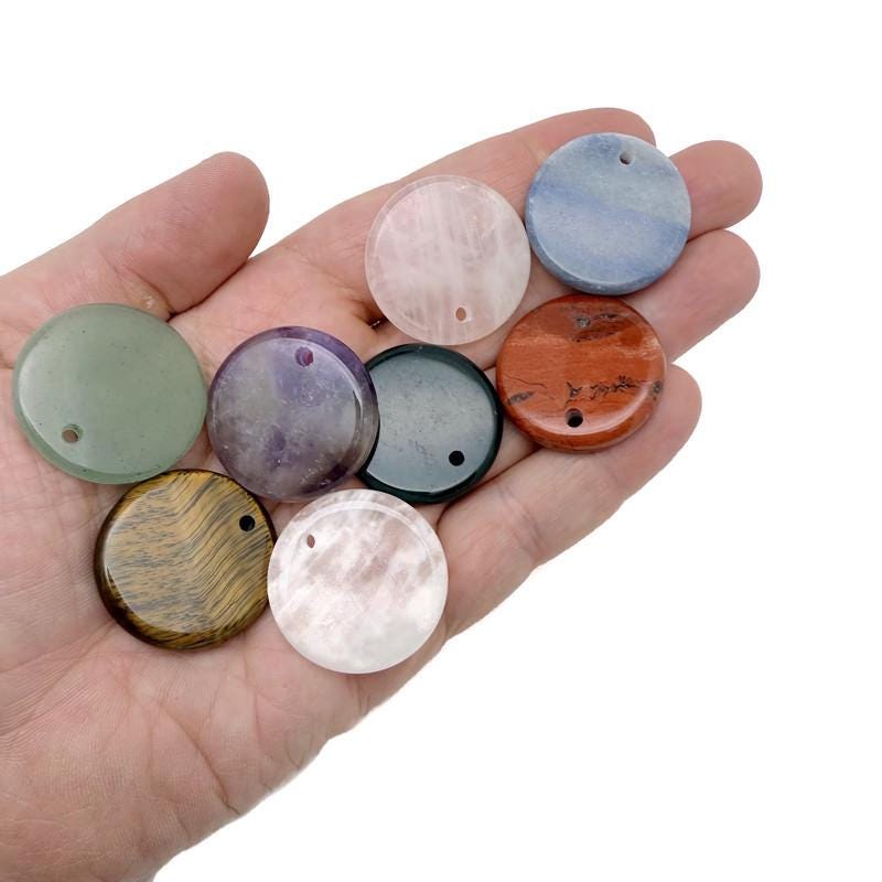 Round gemstone pendant featuring a drilled natural crystal disc charm with colorful mixed gemstones, crafted by GemstoneGO.