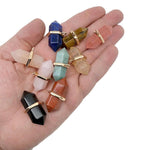 Natural double terminated crystal pendant with a gemstone point, featuring a clear, polished appearance from GemstoneGO.