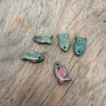Unakite fish-shaped crystal pendant with healing stone, featuring vibrant green and pink hues, jewelry charm by GemstoneGO.