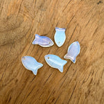 Opalite fish-shaped crystal pendant with gemstone charm, featuring a healing stone design for jewelry.