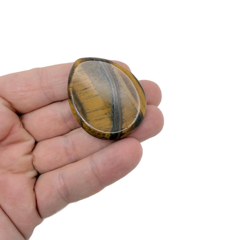 Tiger Eye worry stone from GemstoneGO, 45mm soothing crystal with smooth polished surface and natural golden-brown coloration.
