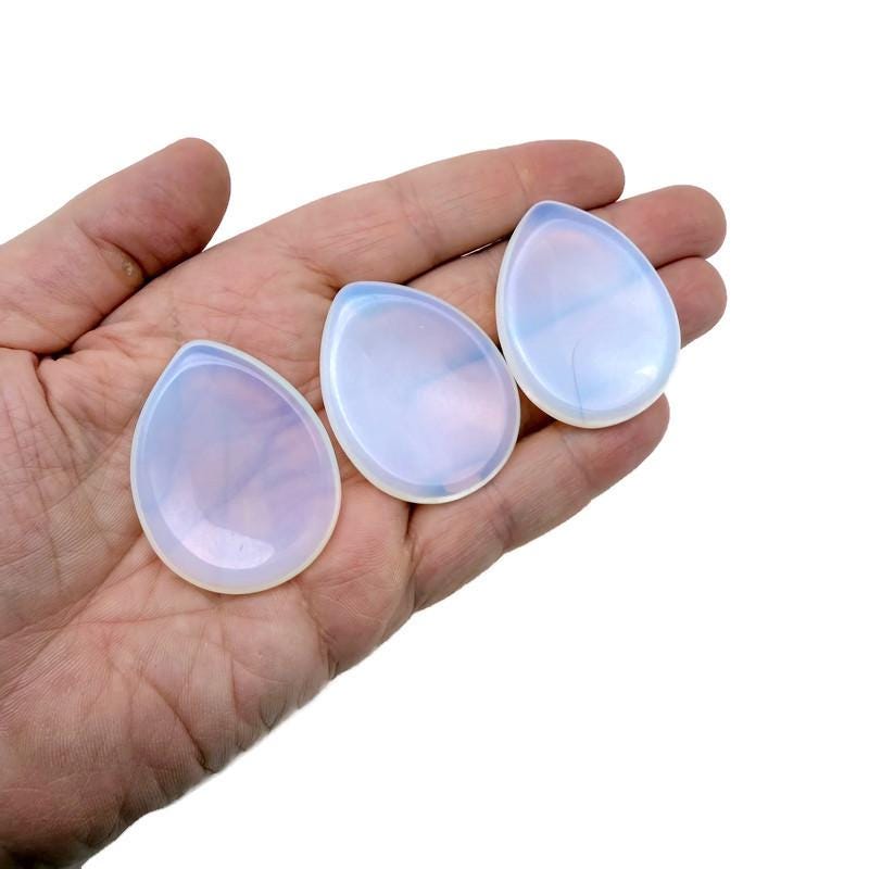 Opalite worry stone with soothing crystal design, 45mm size, by GemstoneGO, smooth polished stone for stress relief.
