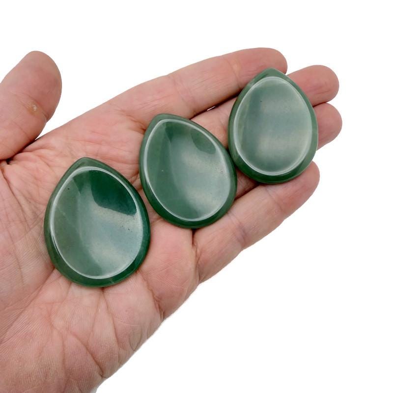 Aventurine worry stone from GemstoneGO, 45mm soothing crystal with polished smooth surface and natural green color.