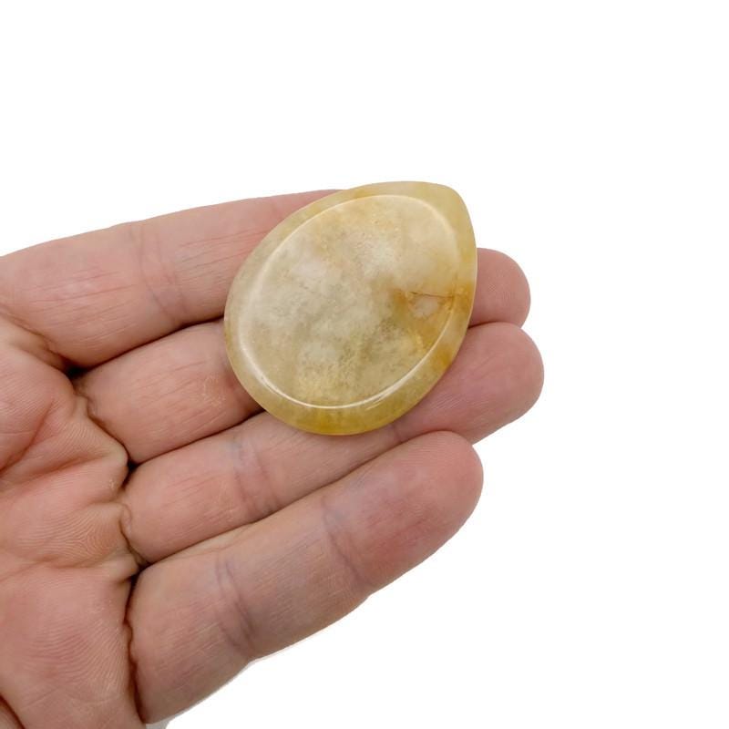 Yellow jade worry stone from GemstoneGO, 45mm soothing crystal with polished smooth surface for stress relief and meditation.