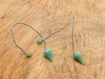 Aventurine crystal pendulum with stainless steel chain, gemstoneGO, showcasing a green aventurine gemstone hanging from a sleek metal chain.