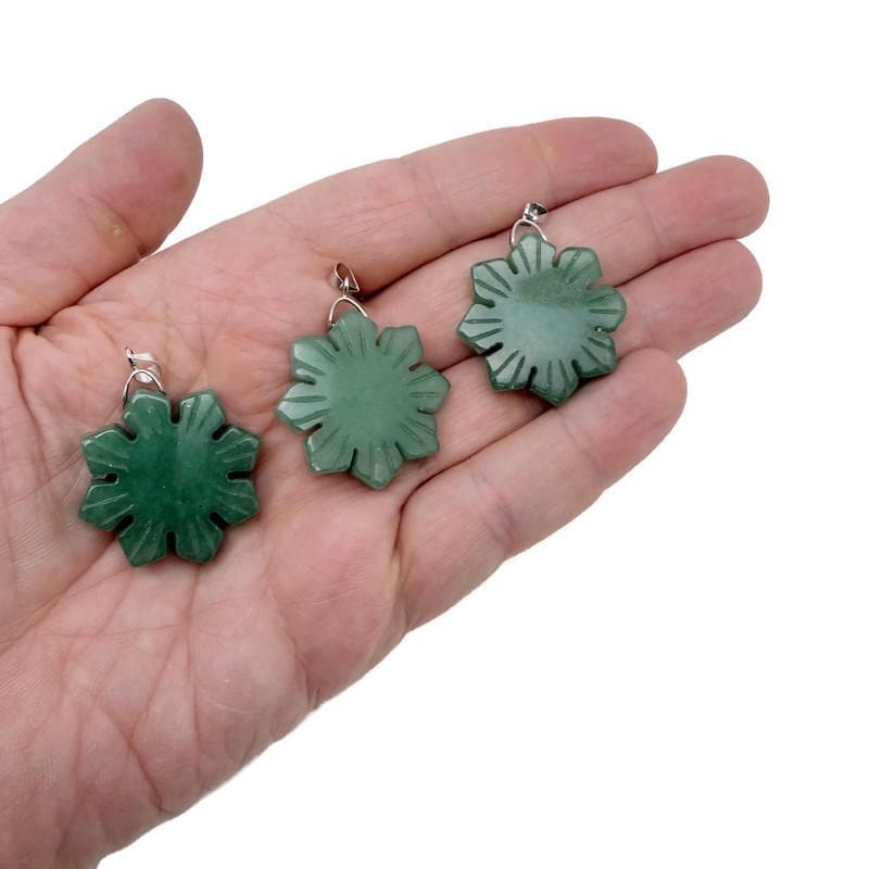 Aventurine gemstone pendant from GemstoneGO featuring a polished green healing stone with a silver bail on a white background.