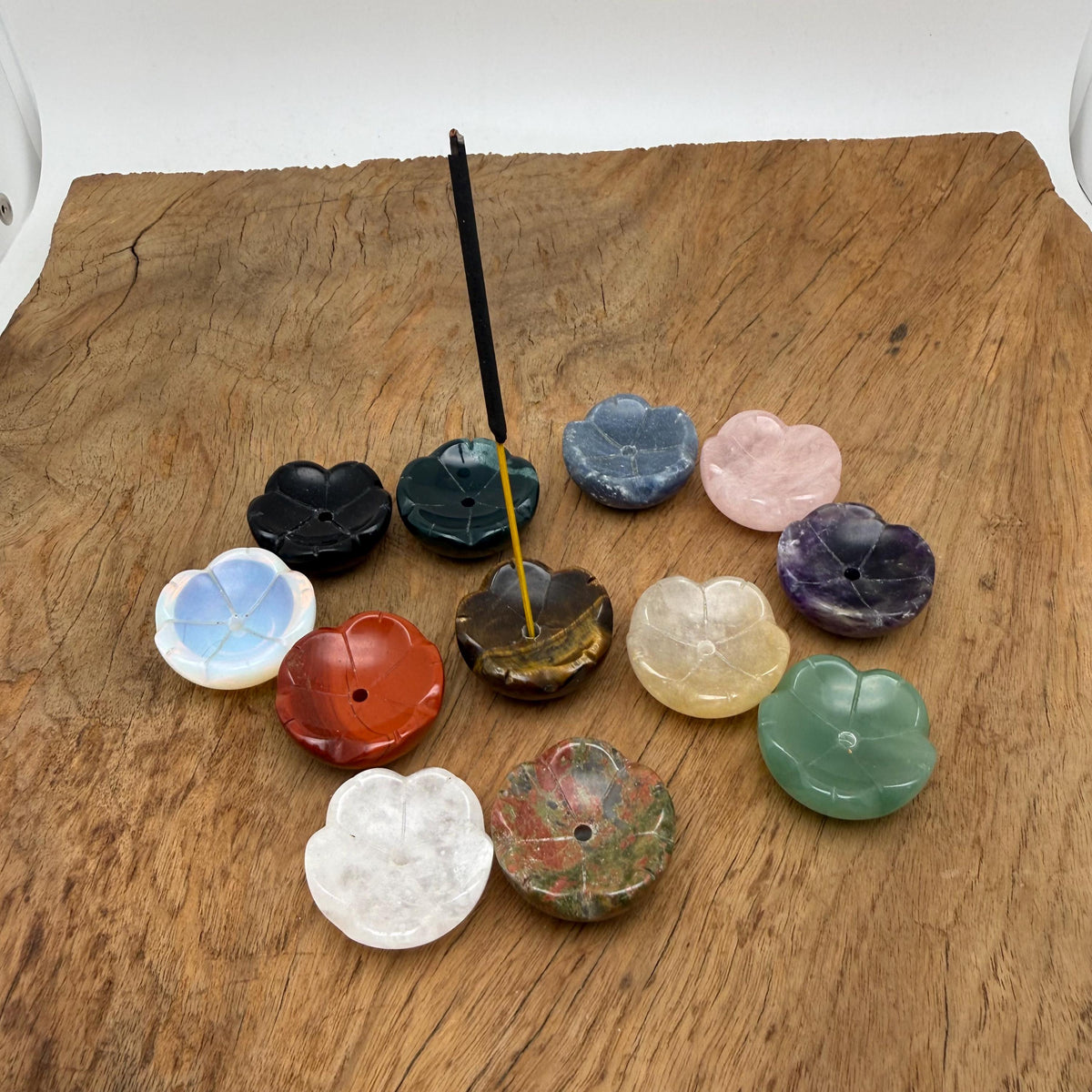 Crystal carving incense holder shaped like a flower from GemstoneGO, designed for cleansing and relaxation.