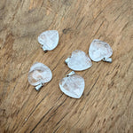 Faceted clear quartz heart crystal pendant from GemstoneGO, natural gemstone charm with detailed faceting and polished finish.