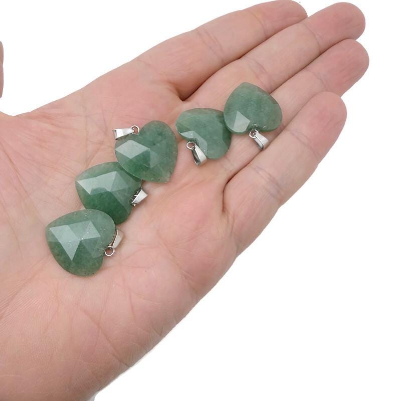 Aventurine faceted heart crystal pendant from GemstoneGO, featuring a natural green gemstone charm with a polished, faceted surface.
