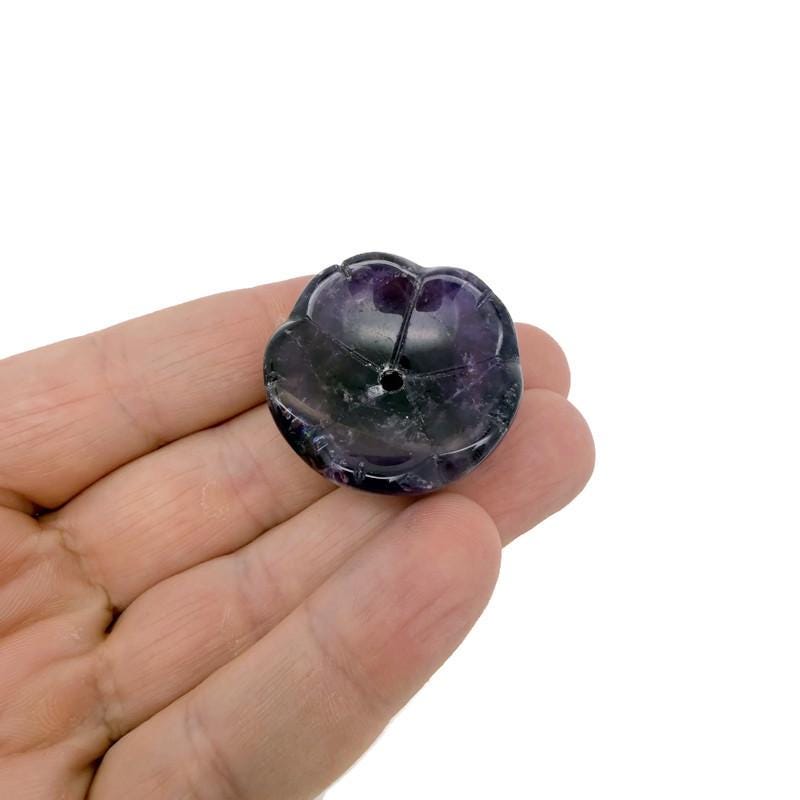 Amethyst crystal flower incense holder from GemstoneGO, designed for cleansing and relaxation with a carved flower shape.