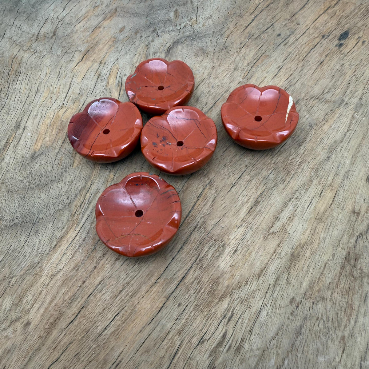 Red Jasper crystal flower incense holder by GemstoneGO for cleansing and relaxation, featuring a detailed flower design.