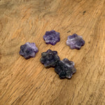 Amethyst natural crystal flower incense holder with carved gemstone design, ideal for meditation and stick burning.