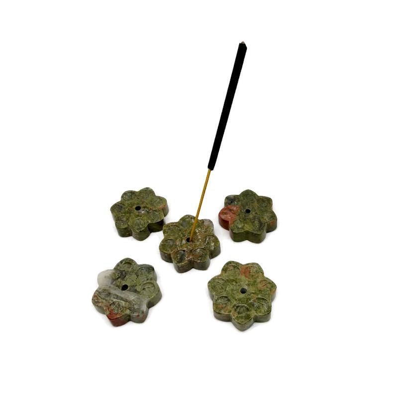Unakite natural crystal flower incense holder carved from gemstone, designed for meditation and holding incense sticks.