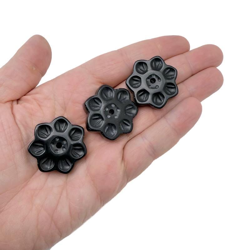 Obsidian natural crystal flower incense holder with carved gemstone design, used for meditation and incense burning.