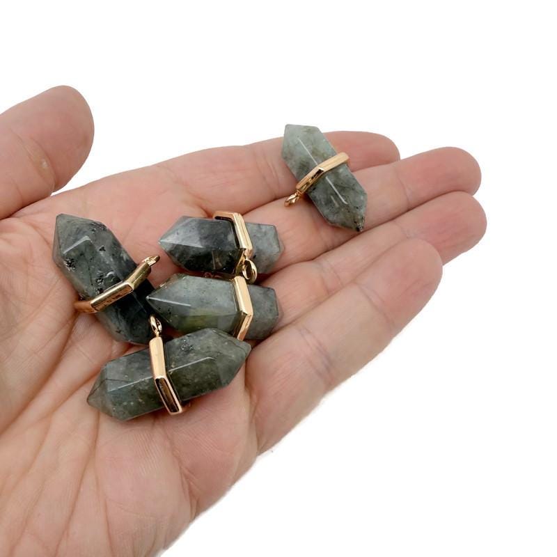Labradorite double terminated crystal pendant from GemstoneGO, showcasing a natural gemstone point with iridescent flashes.