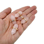 Rose Quartz double terminated crystal pendant from GemstoneGO, featuring a natural gemstone point with smooth, polished surfaces.
