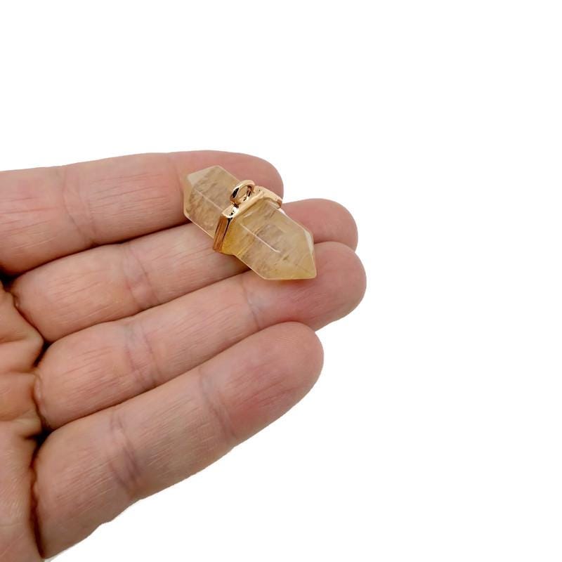 Yellow smelting quartz double terminated crystal pendant with natural gemstone point, showcasing a polished, vibrant yellow mineral pendant.