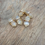 Yellow smelting quartz double terminated crystal pendant from GemstoneGO, showcasing a natural gemstone point with vibrant yellow color.