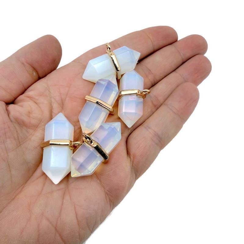 Opalite double terminated crystal pendant from GemstoneGO, natural gemstone point with smooth, polished surfaces.