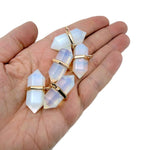 Opalite double terminated crystal pendant from GemstoneGO, natural gemstone point with smooth, polished surfaces.