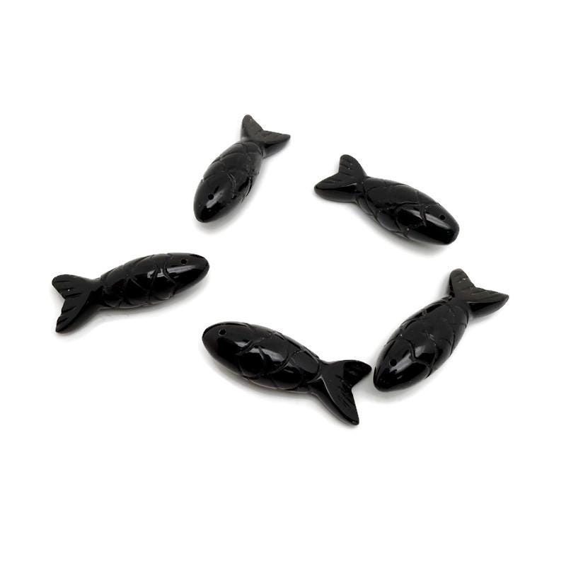 Obsidian fish gemstone pendant from GemstoneGO featuring a polished fish-shaped charm for fishing luck and jewelry.