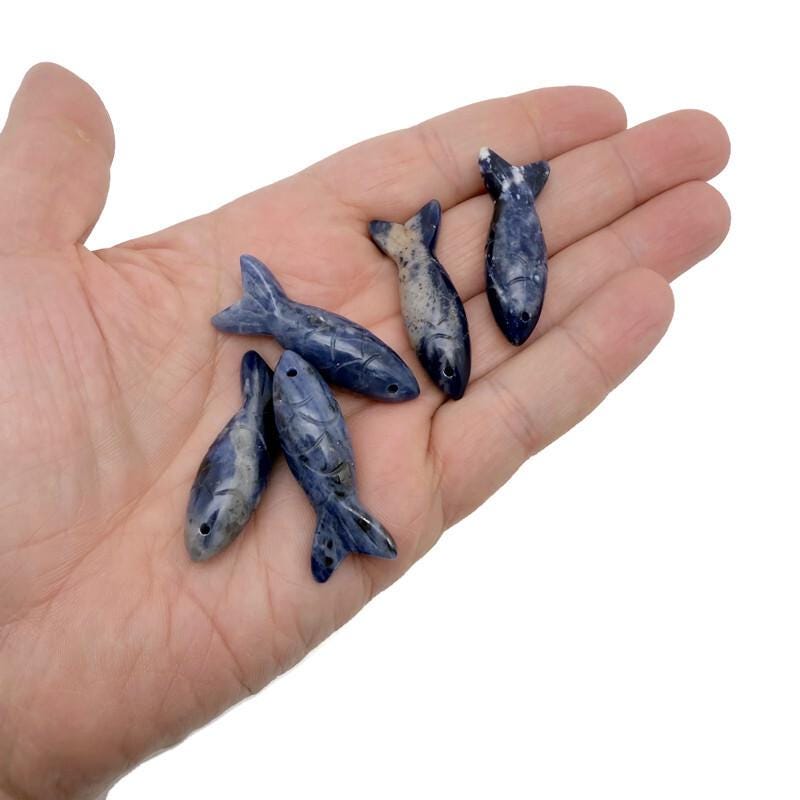 Sodalite fish-shaped gemstone pendant from GemstoneGO, featuring a vibrant blue and white pattern, ideal as a lucky fishing charm.