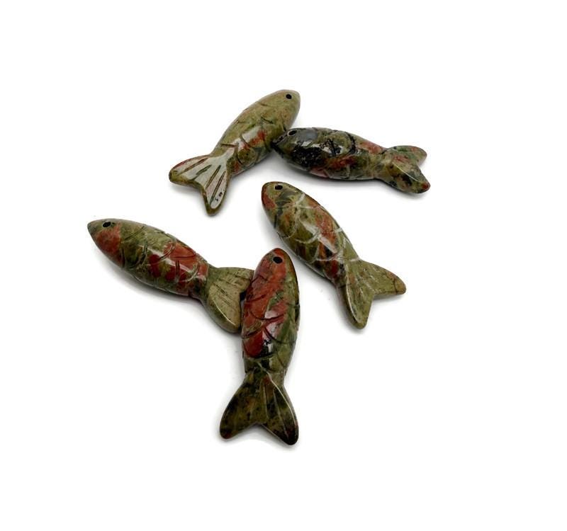 Unakite fish-shaped gemstone pendant from GemstoneGO, featuring vibrant pink and green colors, perfect as a lucky fishing charm.