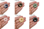 Colorful 30mm crystal donut gift from GemstoneGO with mixed Pi Stone gemstones on a white background.