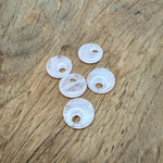 Pink rose quartz crystal donut pendant, 20mm Pi stone with smooth polished surface, from GemstoneGO.
