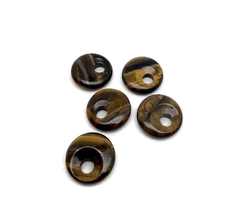 Tiger Eye crystal donut pendant, 20mm Pi stone from GemstoneGO, showcasing the polished, golden-brown gemstone with natural banding.