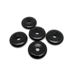30mm obsidian crystal donut with natural black and glossy surface, crafted by GemstoneGO, featuring a smooth, polished finish.