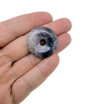 Amethyst crystal donut pendant from GemstoneGO, 30mm Pi stone with purple amethyst color and polished smooth surface.