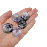 Amethyst crystal donut pendant with a 30mm Pi Stone shape, showcasing purple gemstone and polished surface, by GemstoneGO.