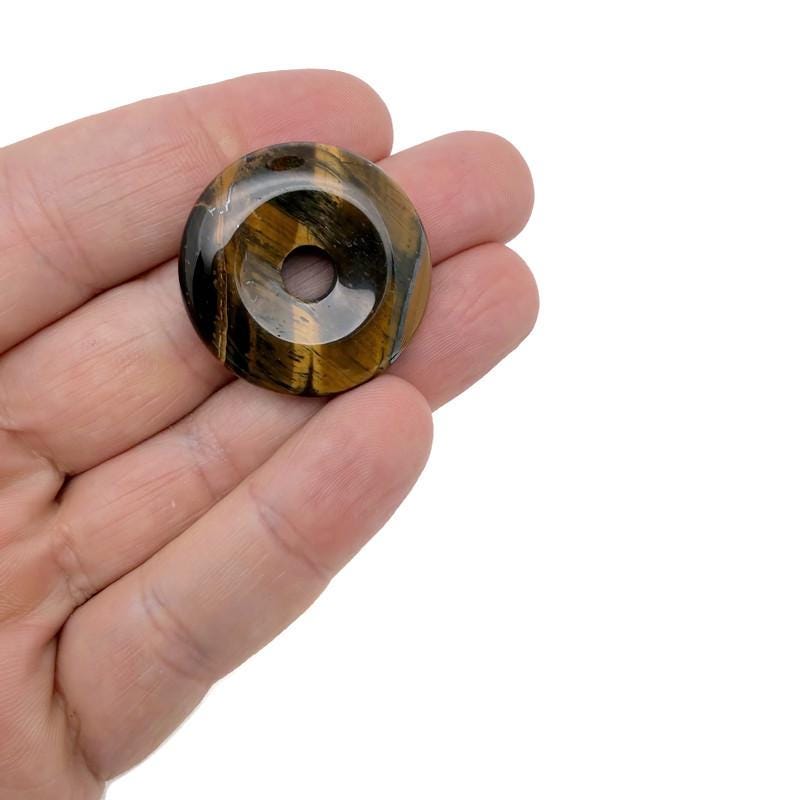 Tiger Eye crystal donut pendant with a polished 30mm Pi Stone design from GemstoneGO, showcasing warm golden-brown hues and natural banding.