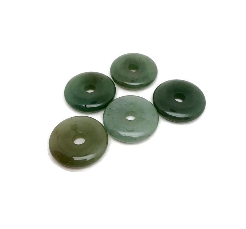 A 30mm aventurine crystal donut pendant with a natural green gemstone and smooth, polished surface, crafted by GemstoneGO.