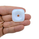 Opalite square crystal donut pendant with Pi stone design, 30mm gemstone from GemstoneGO, showcasing a smooth, polished surface and unique pattern.