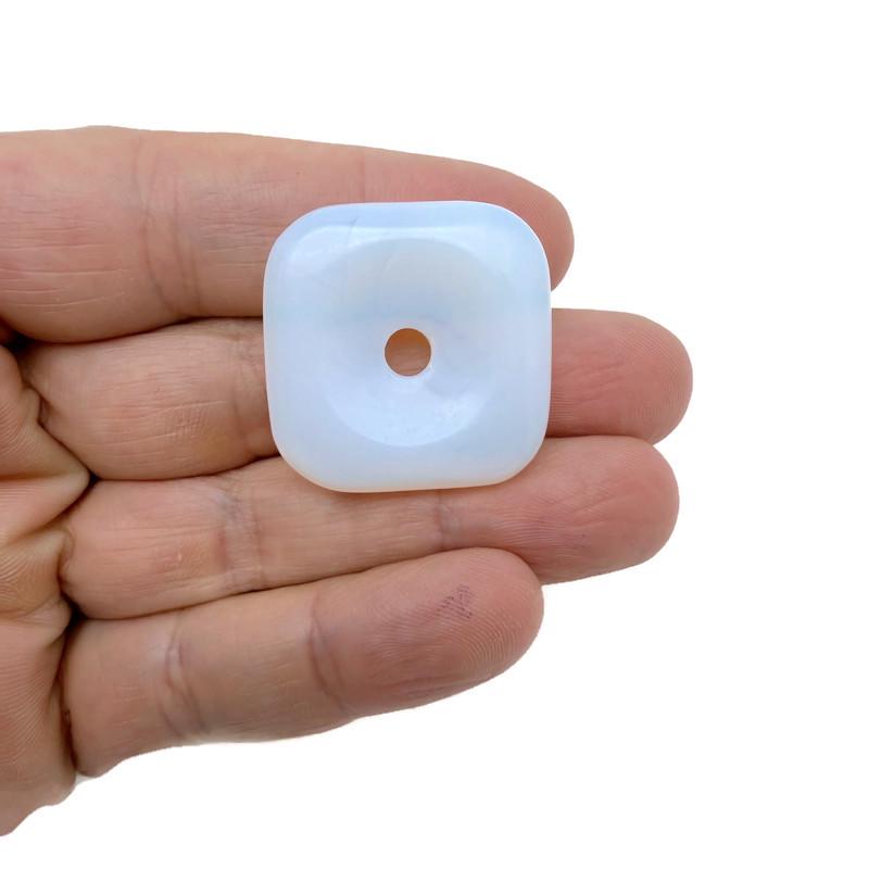 Opalite square crystal donut pendant with Pi stone design, 30mm gemstone from GemstoneGO, showcasing a smooth, polished surface and unique pattern.