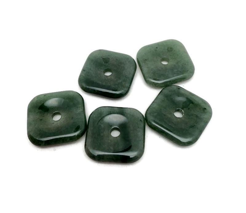 A 30mm aventurine square crystal donut from GemstoneGO, featuring a polished green gemstone with a hole in the center.