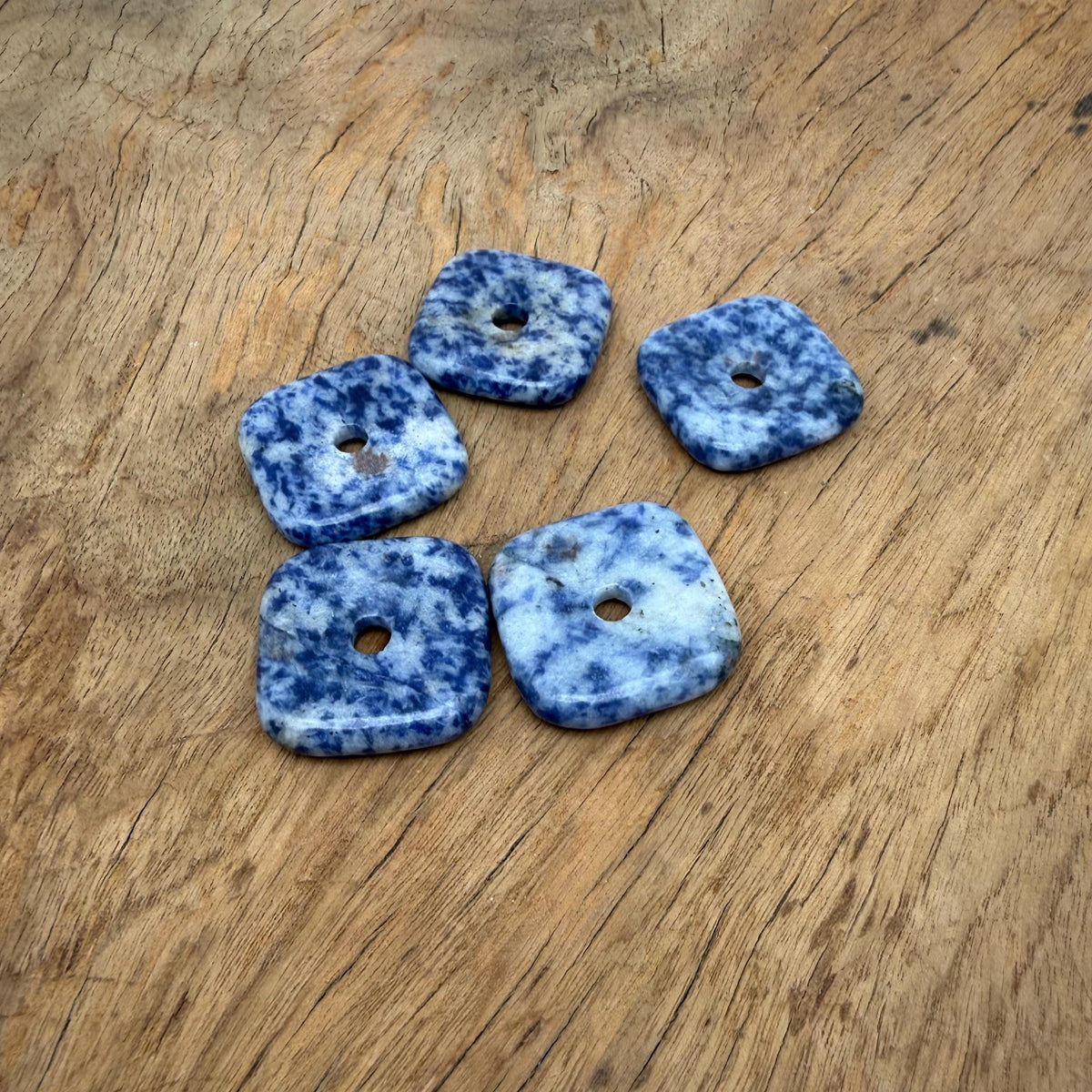 Sodalite square crystal donut pendant, 30mm Pi stone from GemstoneGO, featuring deep blue and white mineral patterns.