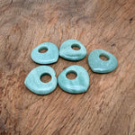 A 40mm Aventurine Love Crystal Heart from GemstoneGO, smooth green gemstone carved into a heart shape, showcasing natural veining.