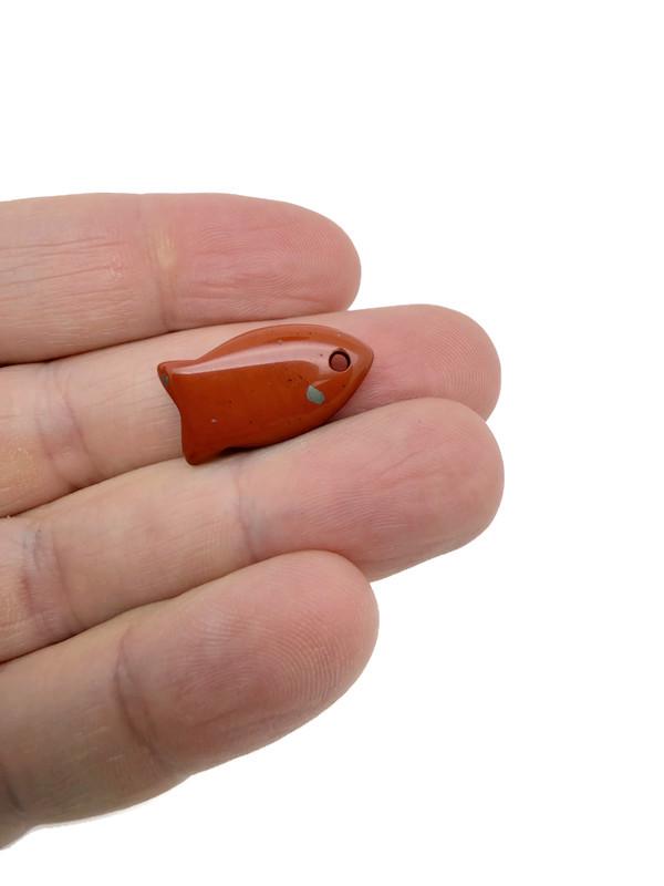 Fish-shaped crystal pendant with a healing stone charm, crafted for jewelry, by GemstoneGO.