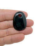 Oval crystal pendant from GemstoneGO featuring a natural stone bead for jewelry making, with a smooth, polished surface.