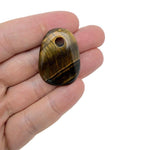 Oval crystal pendant from GemstoneGO, natural stone jewelry bead with a smooth polished surface, ideal for DIY jewelry making.