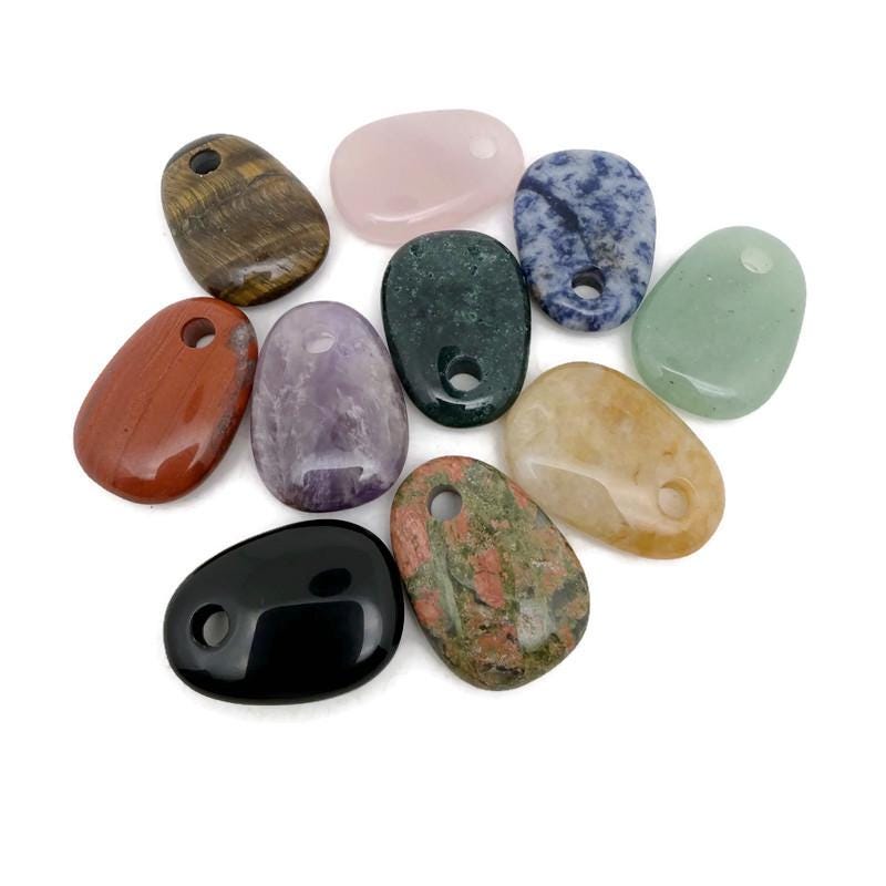 Oval crystal pendant from GemstoneGO, natural stone jewelry making bead with a polished oval shape and mixed colors.