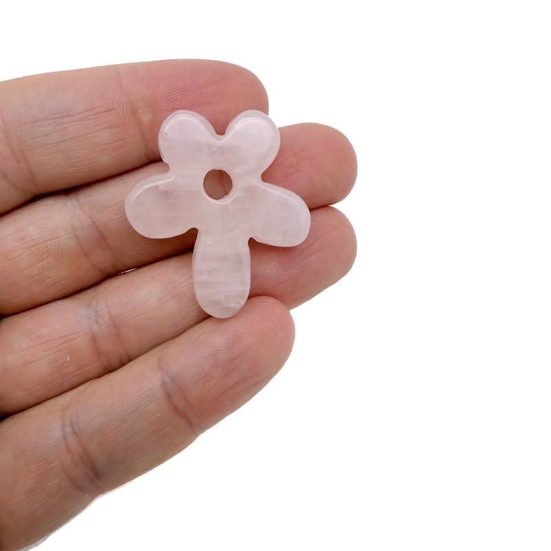Carved crystal flower gemstone pendant from GemstoneGO with colorful gemstone accents on a silver chain.