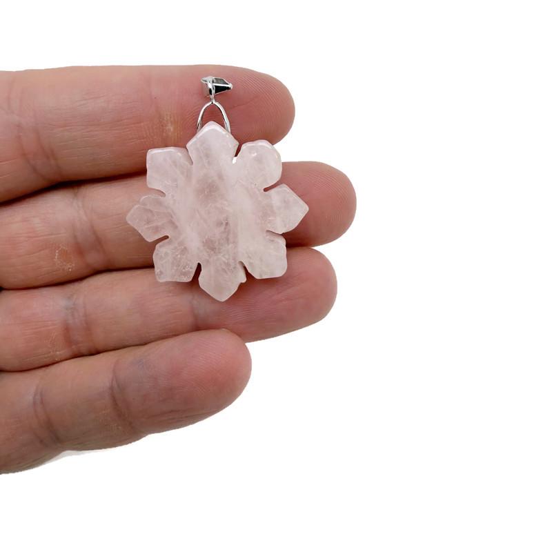 Snowflake gemstone pendant from GemstoneGO featuring a healing stone with a unique snowflake pattern on a silver chain.