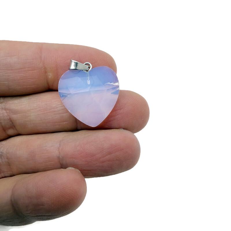 Faceted heart-shaped natural crystal pendant with a gemstone charm from GemstoneGO, showcasing its sparkling, clear crystal design.