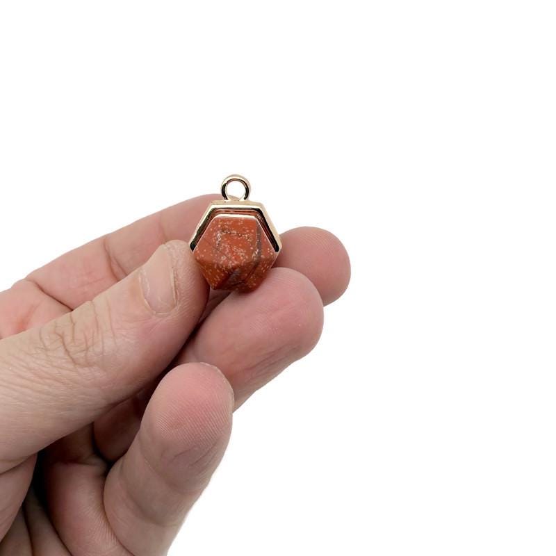 Natural double terminated gemstone crystal pendant from GemstoneGO, showcasing a polished, pointed natural mineral gemstone.