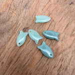 Aventurine fish-shaped crystal pendant with natural green gemstone, designed as a healing stone fish charm for jewelry.
